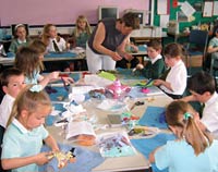 Children at work on their rag rugs